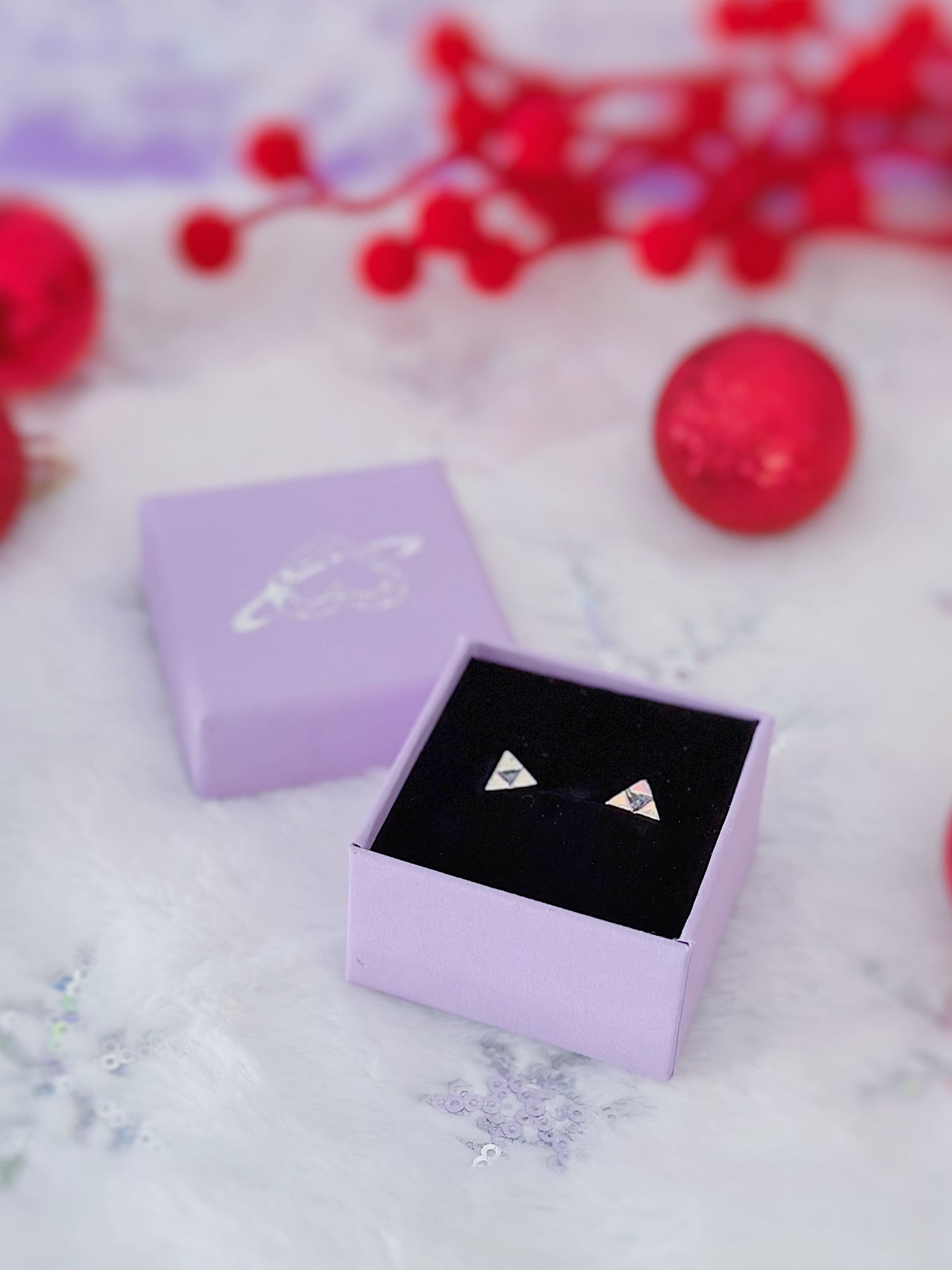 Puce Boucle d'oreille des Trois Forces
